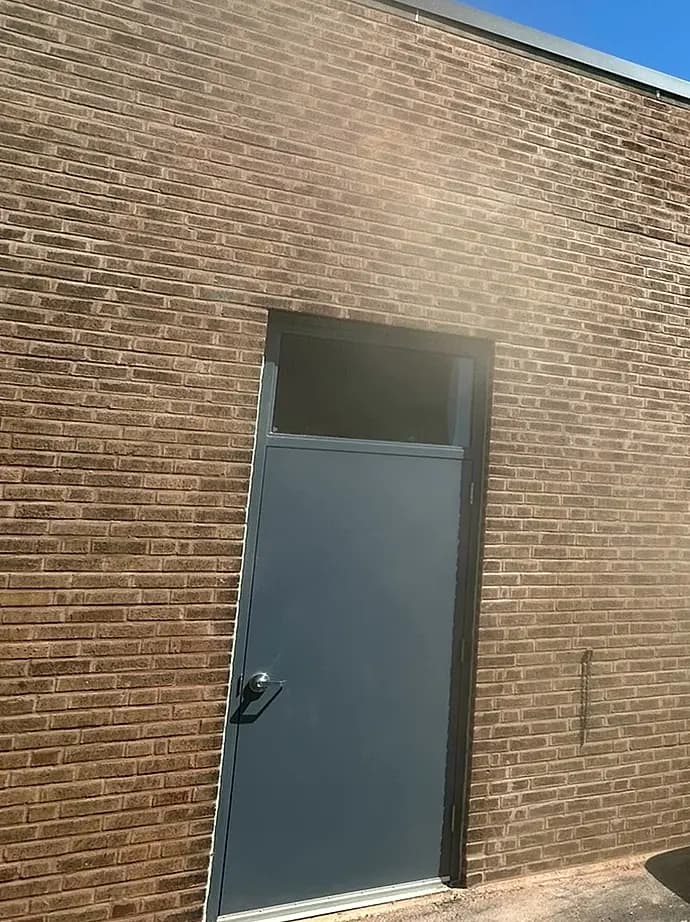 Replacement brick matched into the existing field