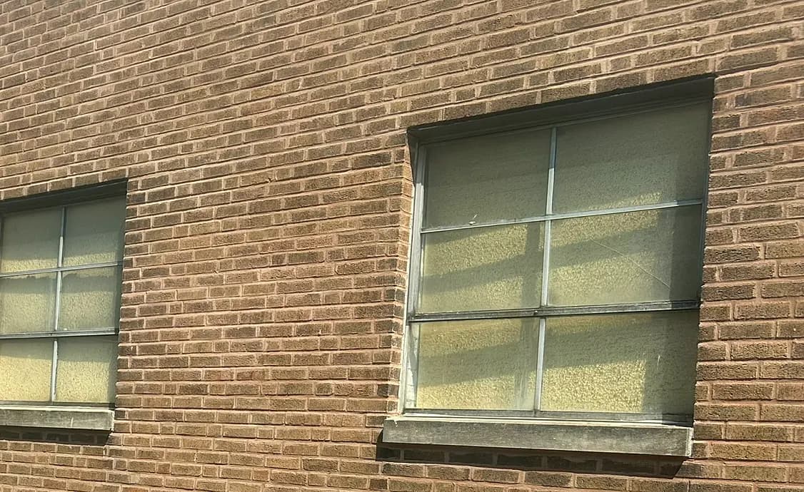 Window-perimeter joints sealed after masonry repair