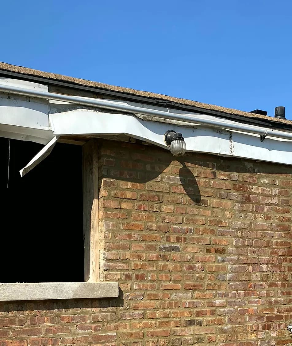 Brick reset above a repaired opening