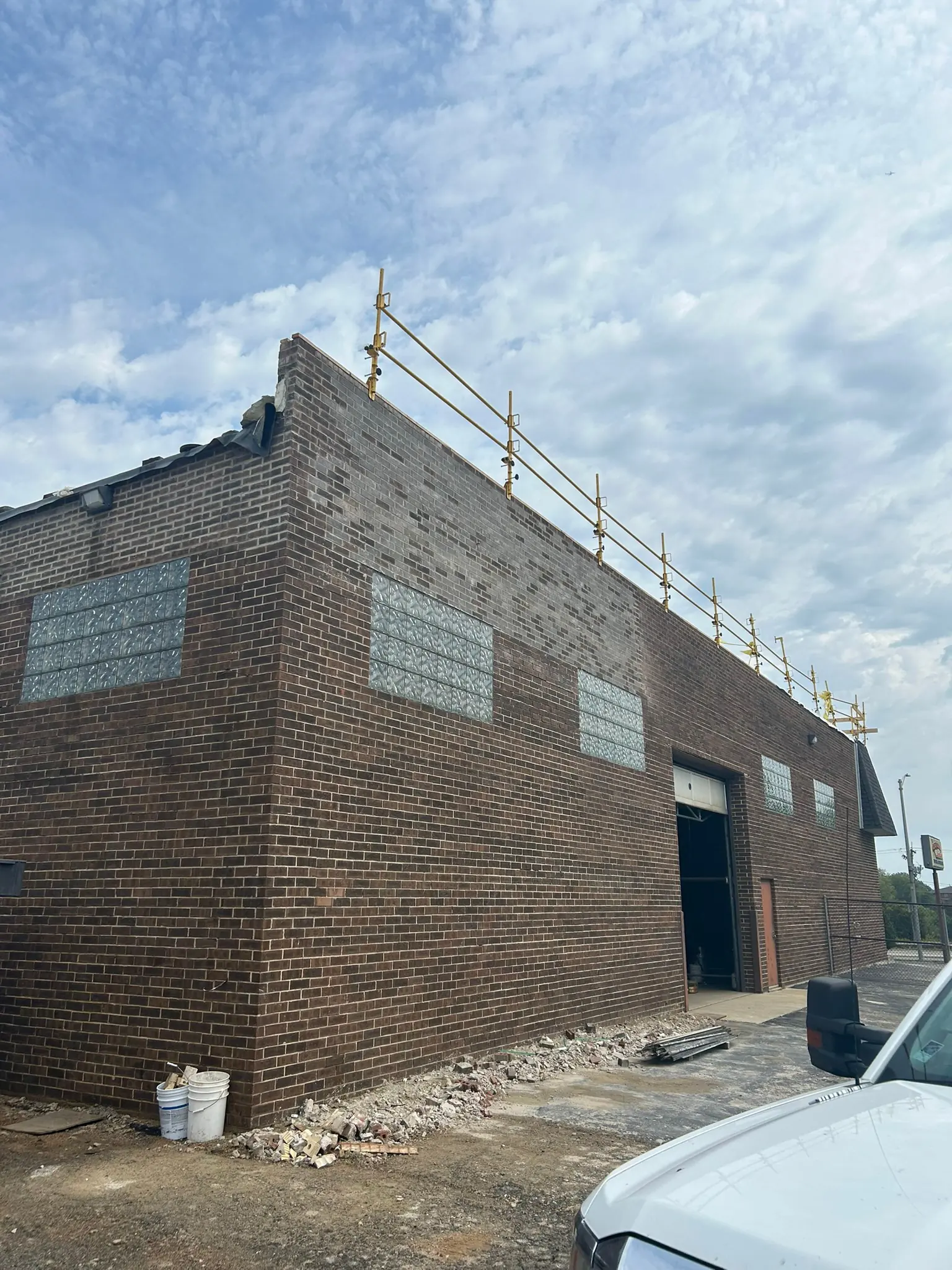 Repaired steel lintel and rebuilt brick above a window on a Berwyn, IL bungalow
