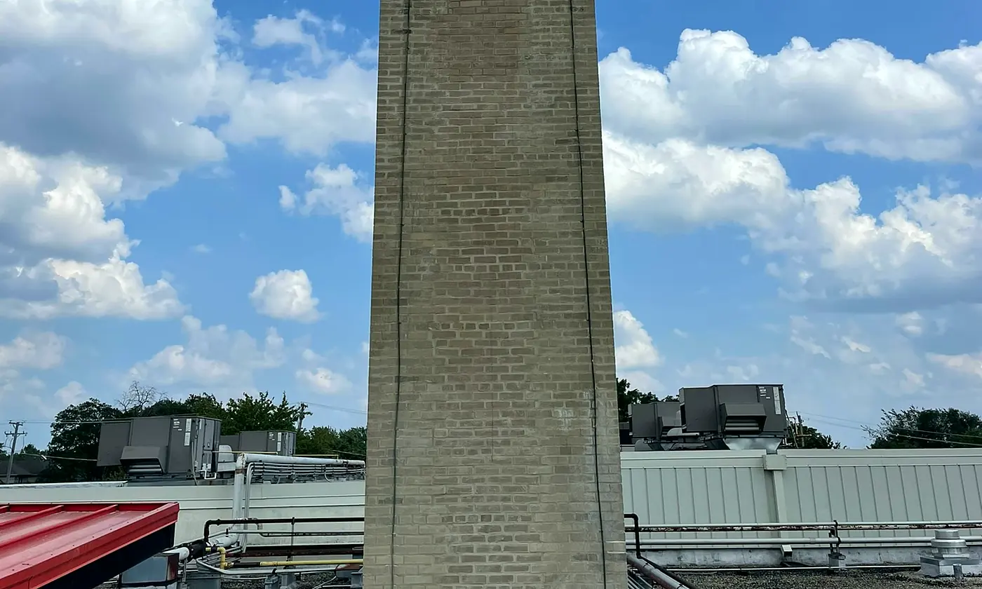 Roof-level masonry on an occupied building